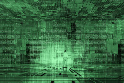 Business man looking at a wall of data